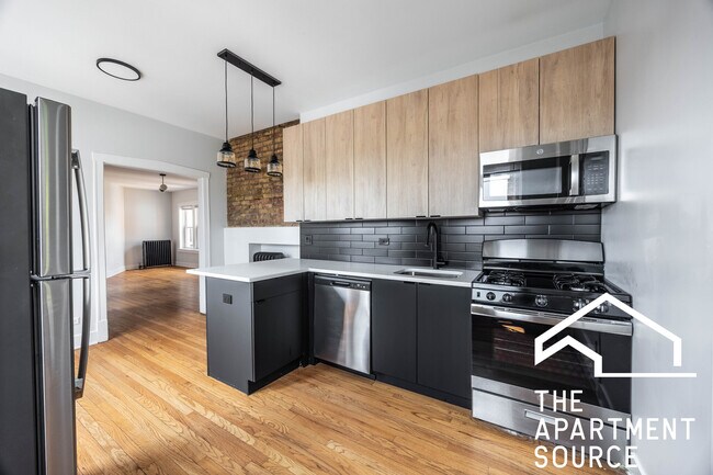 Foto del edificio - 4011 N Lowell Ave