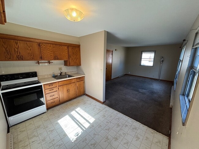 Kitchen into LR - 3957 N 92nd St