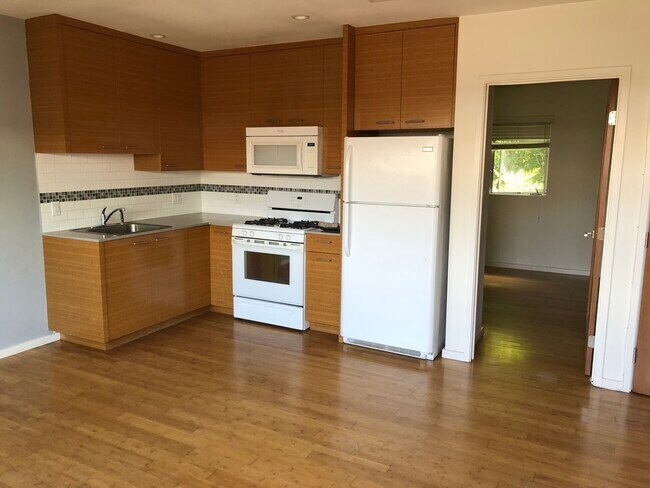 Living Room, Stove, Fridge & Microwave included - 3575 Helms Ave