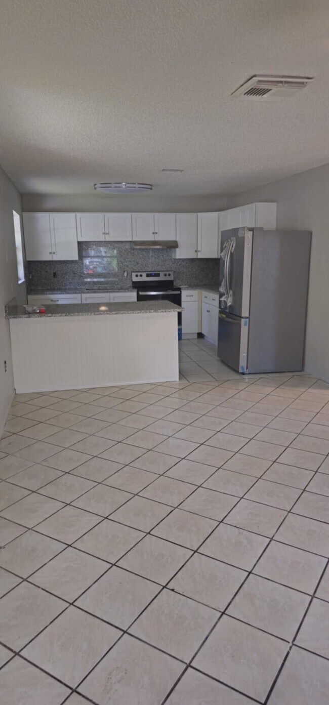 Foto del edificio - 7133 Pinewood Dr