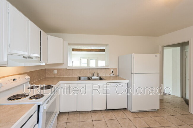 Building Photo - 5551 Tucson St