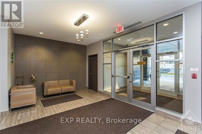 Building Photo - 100-100 Champagne Ave S