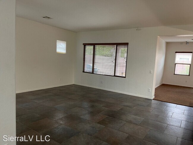 Building Photo - 4 br, 2 bath House - 5942 Spanish Mustang Ct