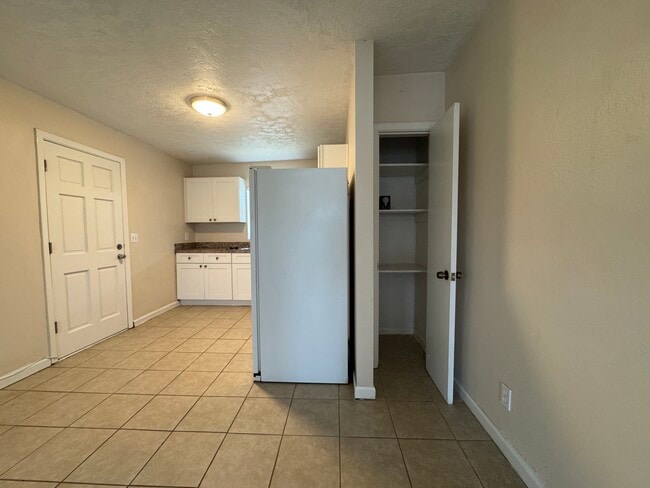 Looking into kitchen with door leading to back yard - 405 Upper 8th Avenue South