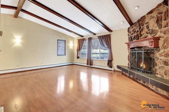 Building Photo - Spacious Home with Garage & Fenced Yard Near JBER & Major Hospitals