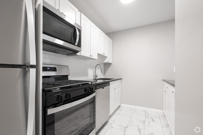 2BR, 1BA - 810SF - Kitchen - 8200W Apartments