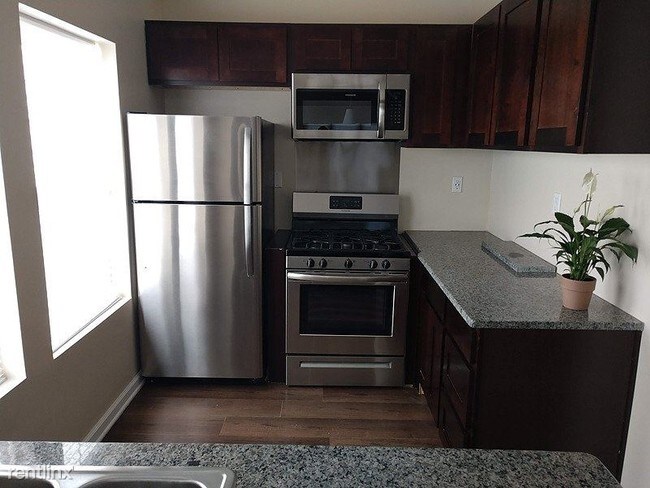 Foto del edificio - 1458 E 115th St