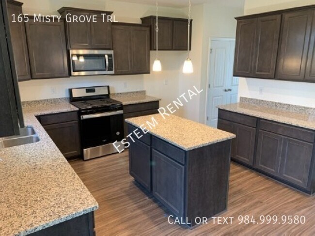 Foto del edificio - 165 Misty Grove Trail