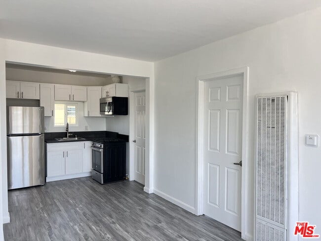 Building Photo - 6031 8th Ave