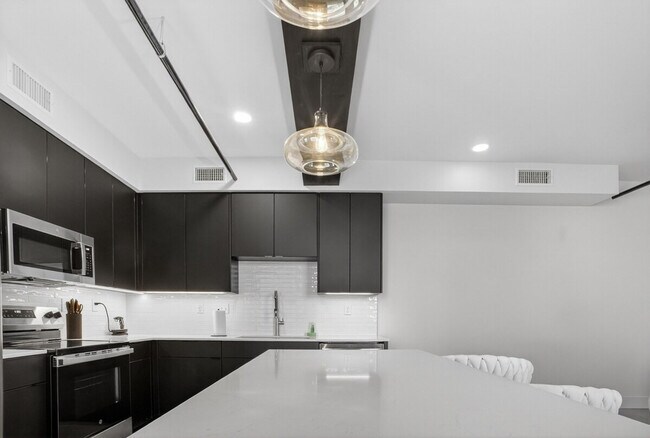 Foto del edificio - 116 W 3rd St