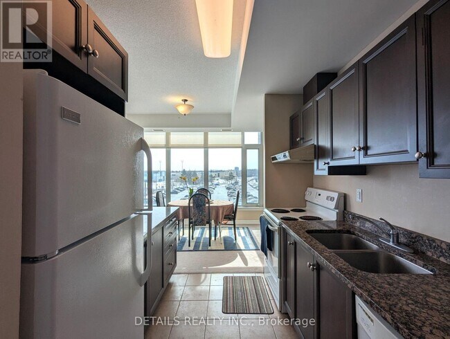 Building Photo - 100 Roger Guindon Ave
