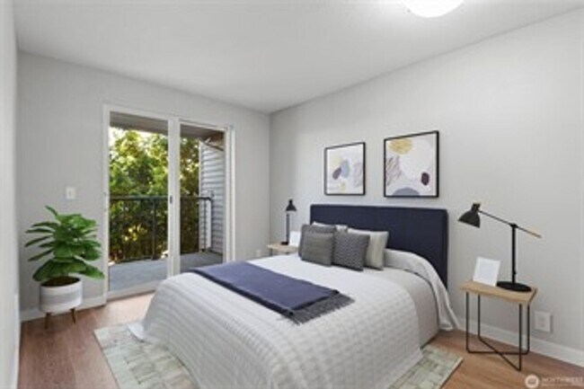 Foto del edificio - Modern 1-Bedroom Condo in Vibrant Greenwood Neighborhood