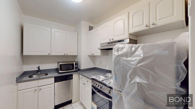 Foto del edificio - 236 E 36th St
