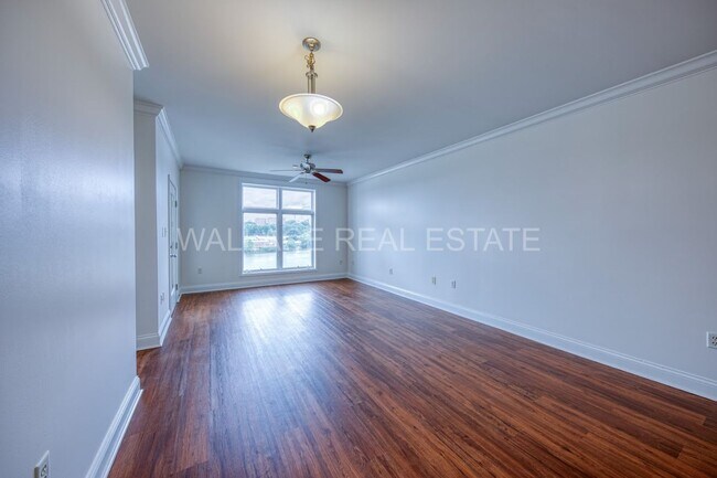 Foto del edificio - 3 BEDROOM CONDO IN RIVER TOWNE - A GATED LAKEFRONT COMMUNITY!!