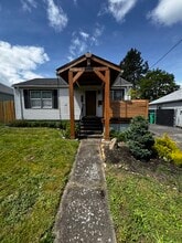 Building Photo - 1215 NE 79th Ave