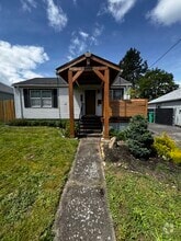 Building Photo - 1215 NE 79th Ave