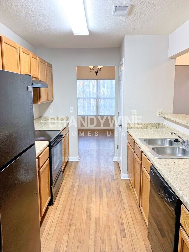 Building Photo - Charming 2BR with Car Garage!