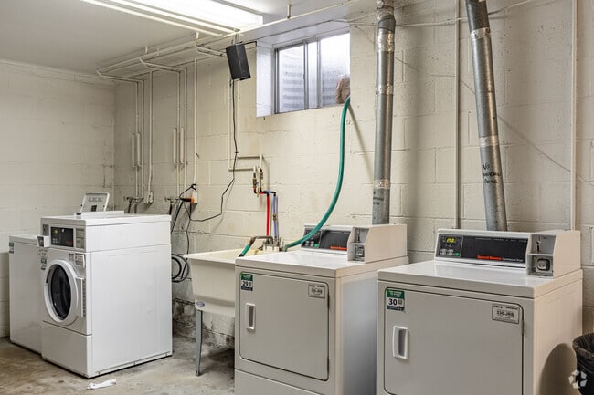 Laundry Room - Camelot Apartments