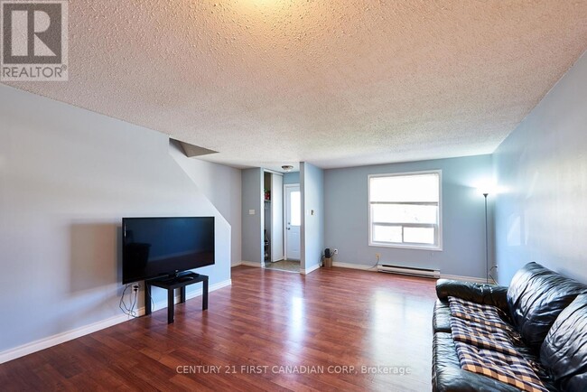 Photo du bâtiment - 311-311 Vesta Rd
