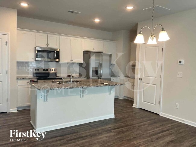 Foto del edificio - 10743 Rivergate Dr NW