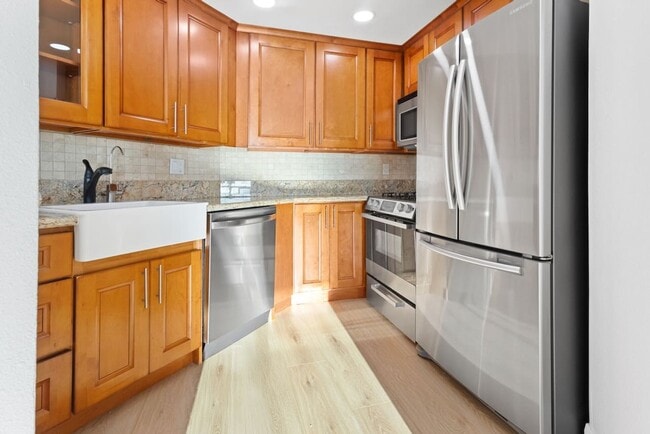 Building Photo - Ocean View 2 Bed Condo with Private Balcony + Garage