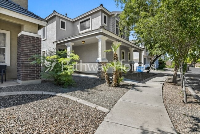 Building Photo - 8749 E Laguna Azul Ave