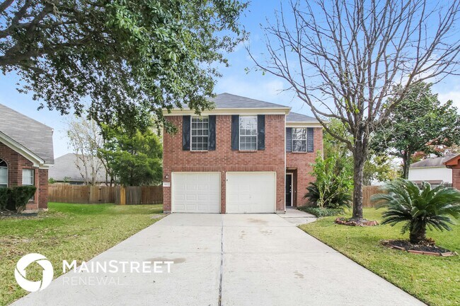 Building Photo - 8822 Woodcamp Dr