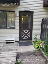 Building Photo - 7104 72nd Ln N