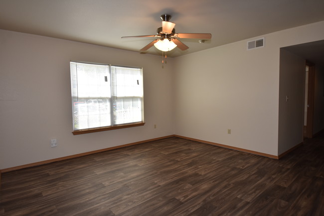 3BR Living Room - Rock Creek Apartments