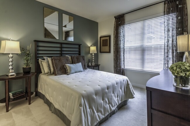 Plush carpeting with padding in bedrooms along with 2' plantation blinds - The Reserve at Tysons Corner