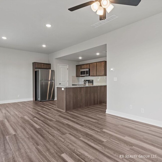 Building Photo - Brand New 3 Bed 2 Car End Unit Townhome in...