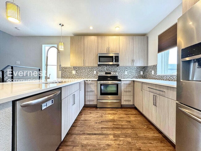 Building Photo - 8130 W 10th Ave