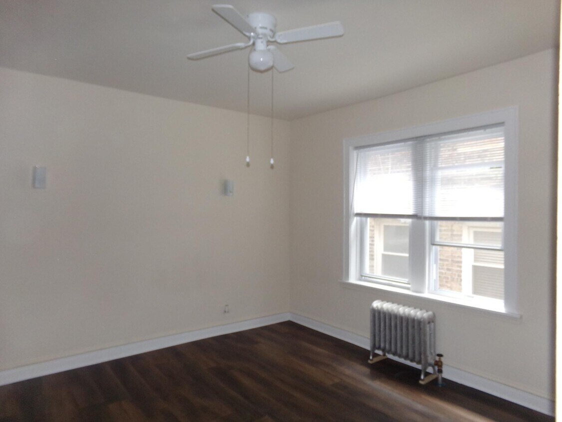 Foto del edificio - 6916 N Lakewood Ave