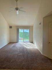 Living room with carpet - Glen Haven Circle