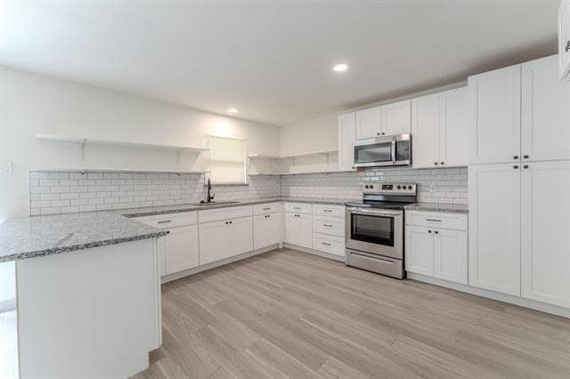 Foto del edificio - 8652 Wolfwood Ln