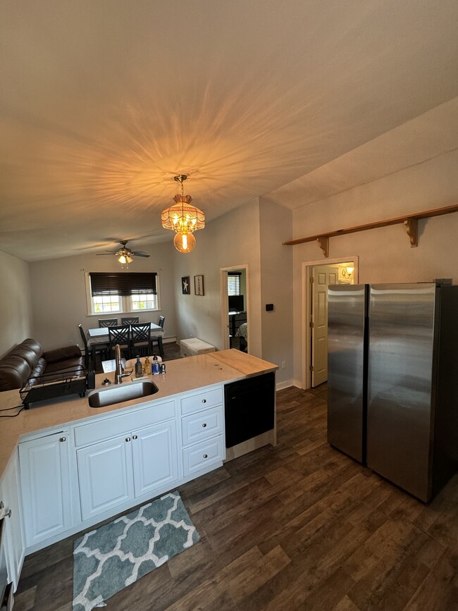 Full picture of main area with dishwasher and refrigerator. - 21 Wallis Ave