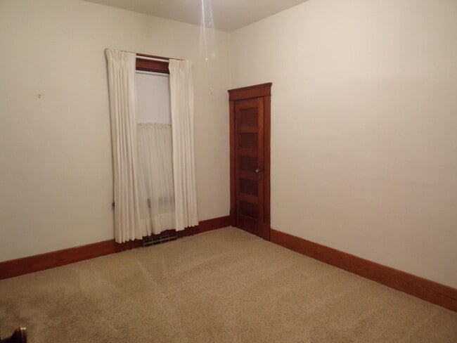 MAIN FLOOR BEDROOM - 901 E 3rd Ave