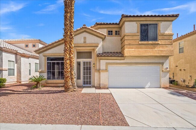 Building Photo - Contemporary Guard-Gated Retreat Near Rhodes Ranch Golf Club with Elegant Open-Concept Living