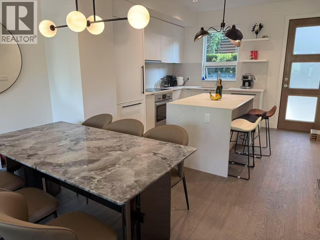 Photo du bâtiment - 975 W 52nd Ave