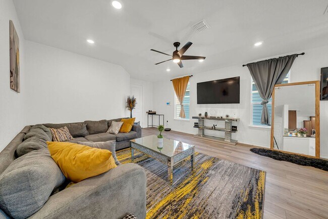 Building Photo - Move-In Ready with Premium Upgrades Throug...