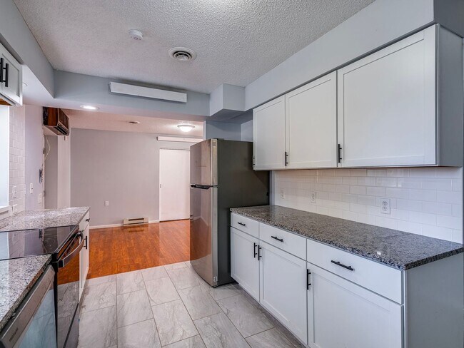 Building Photo - Available NOW; nicely remodeled home in ex...