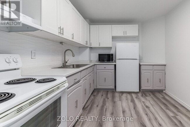 Photo du bâtiment - 66-966 Greenview Dr