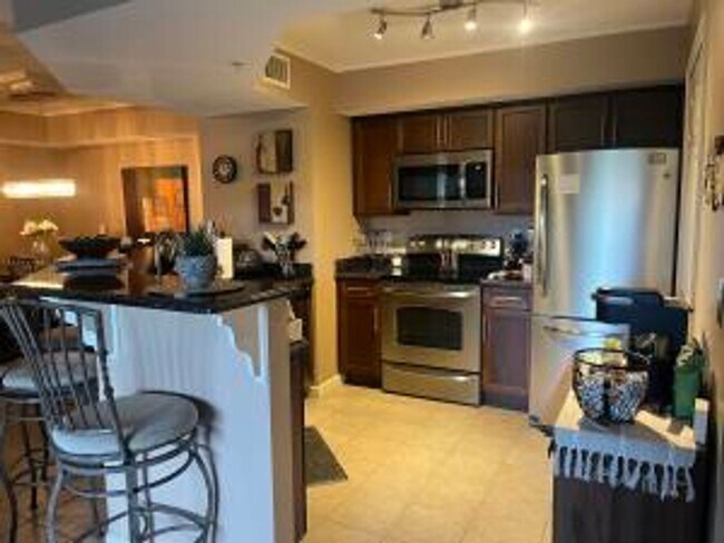 Building Photo - 2/2 Condo with Lake Views in Portofino at ...