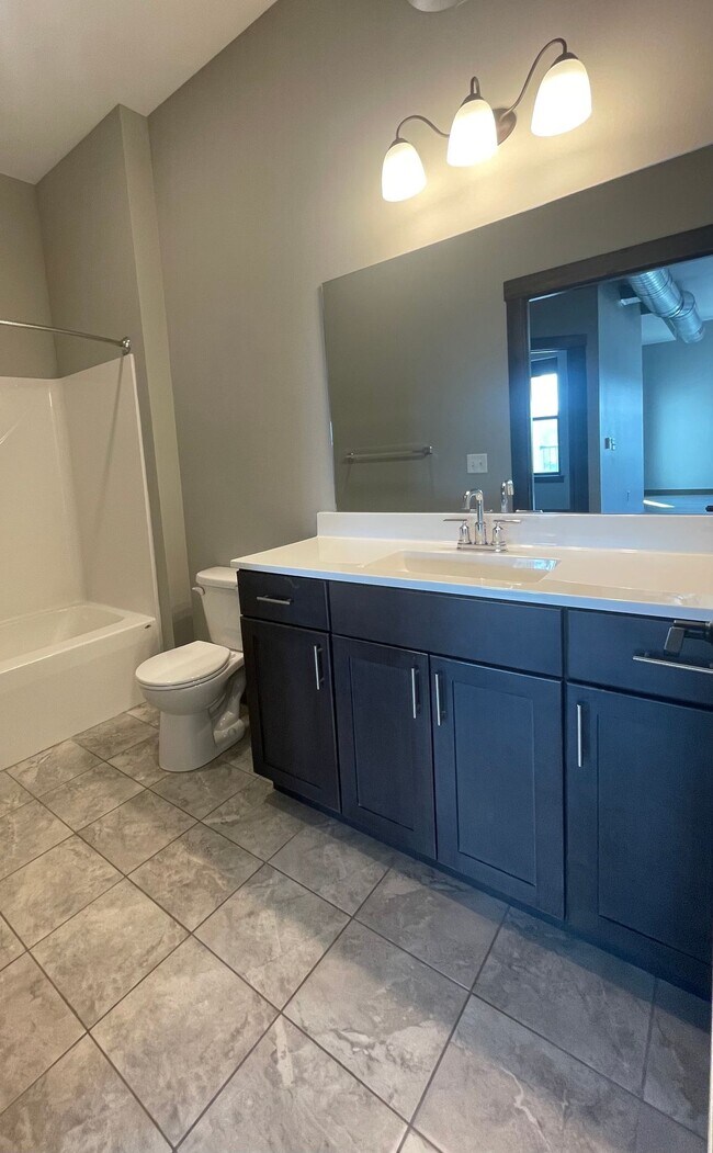 Building Photo - NewBo 2BR with High Ceilings & In-Unit Laundry