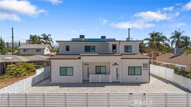 Building Photo - 11140 Woodley Ave