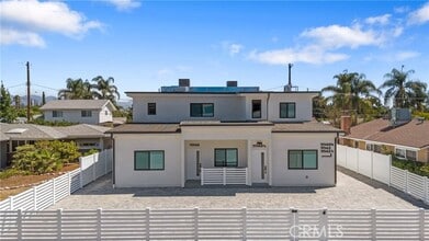 Building Photo - 11140 Woodley Ave