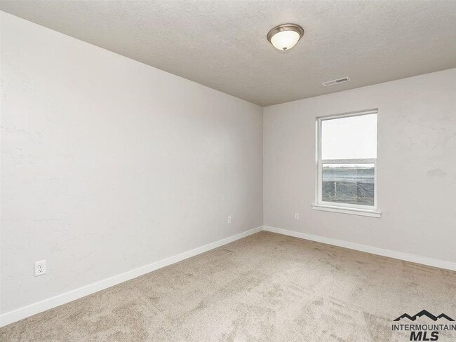 Building Photo - Charming 3 Bedroom Home in Nampa _ Pet Fri...