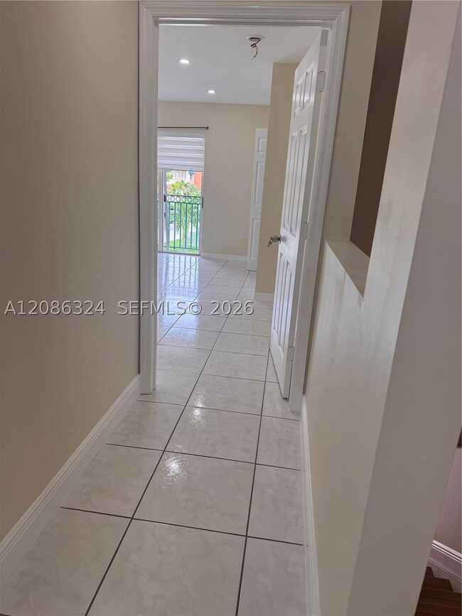 Building Photo - 7075 NW 173rd Dr