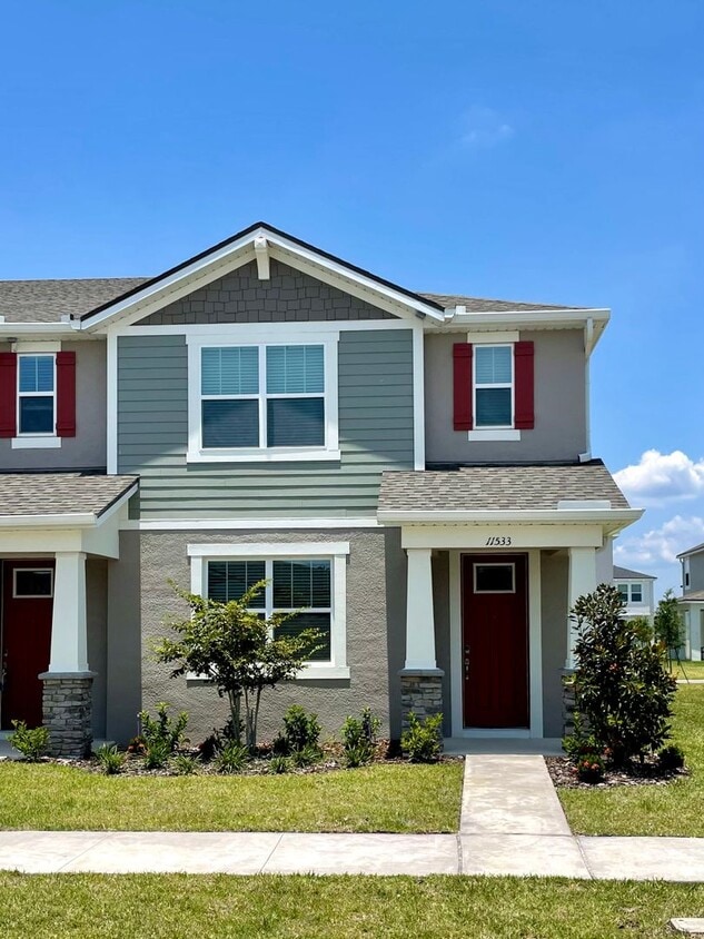 Primary Photo - Newer 4 Bedroom, 2.5 Bath Corner Unit Town...