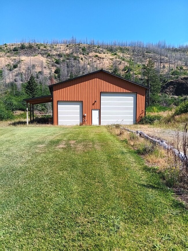 Building Photo - Beautiful Chalet Style Riverfront Property...